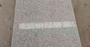 云浮芝麻白光面毛板